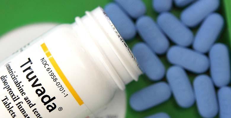Truvada medication bottle with blue pills